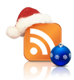 Новогодняя RSS - классическая оранжевая  иконка RSS  квадратной формы в новогоднем колпаке, а рядом лежит небольшой синий ёлочный шар со снежинками 