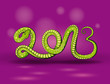 Зелёный змей изгибаясь образует надпись 2013.