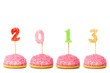 Четыре торта, а в них воткнуты свечки-цифры образующие надпись 2013.