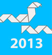 На синем фоне две змеи оригами и надпись 2013 белыми цифрами.